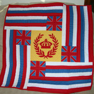 My miniature version of a traditional Hawaiian flag quilt, Ku`u Hae Aloha (My Beloved Flag).